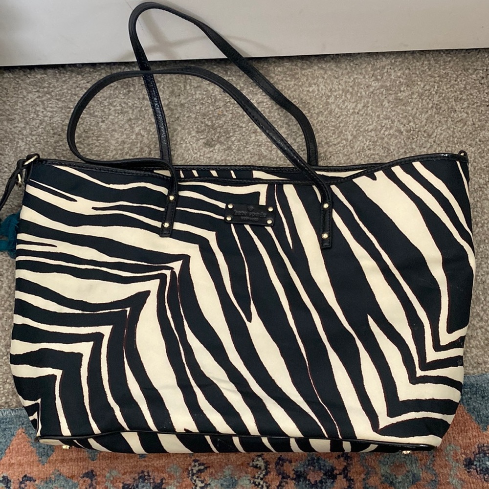 Animal print baby bag with changing mat
